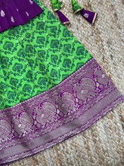 Exquisite Wine And Green Kanjivarm Silk Lehenga With Top